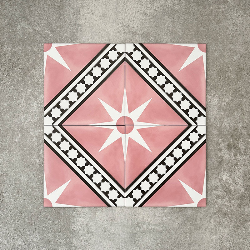 Gilgamesh Pink Moroccan style 20x20cm patterned tiles, shown as a flat lay to highlight the repeating pink, black and white geometric star pattern.