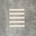 Zellige Chalk White Moroccan-style bullnose tiles in a 3 × 20cm format, shown in a soft matt ceramic finish.