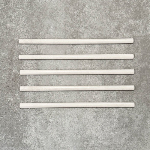 Allegra Blanca Gloss pencil bullnose border ceramic tiles in a 1.2 × 30cm format, shown as a set to highlight the glossy white finish, smooth rounded edges and subtle handmade-style variation for decorative borders and trims.
