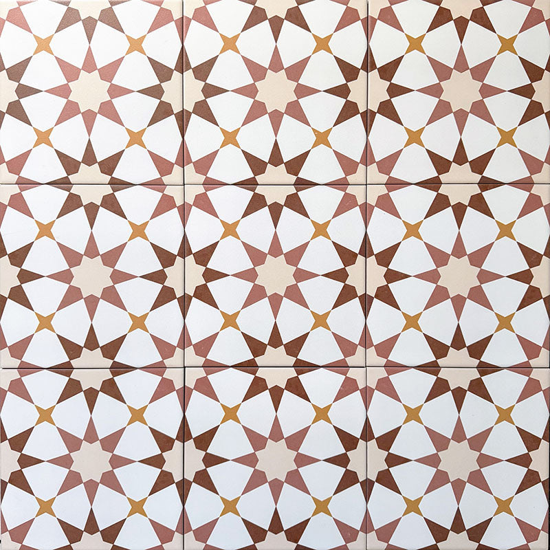 Agadir Cotto Moroccan-style 20x20cm porcelain floor tiles laid in a repeating geometric star pattern, showcasing warm terracotta, white and soft yellow tones in a coordinated tile layout.