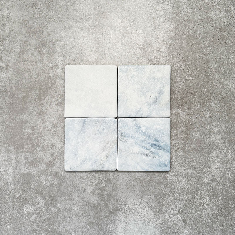 Product image of Amalfi Square Azul Vintage Marble wall and floor tiles in an 11cm x 11cm format, featuring soft blue and white marble effect detailing, subtle veining and gently rounded vintage-inspired edges.