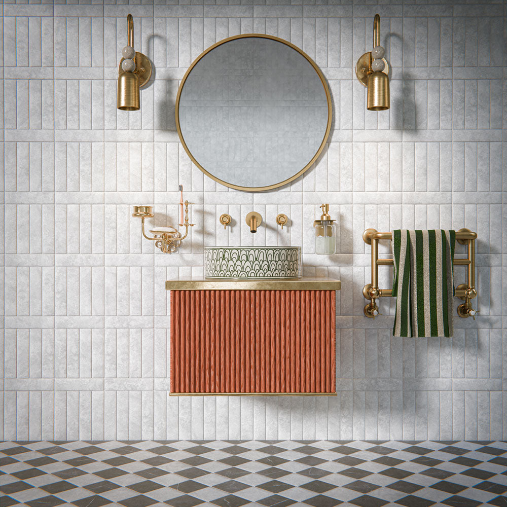 Bathroom featuring Amalfi Brick Carrara Vintage Marble 5.4x22cm wall and floor tiles, installed in a brick layout, showcasing soft white and grey tones, paired with brass fittings, textured details, and a refined, classic contemporary finish.
