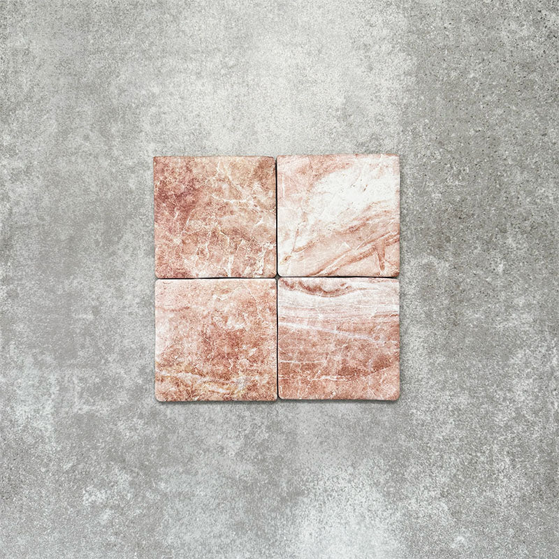 Product image of Amalfi Square Rouge Vintage Marble wall and floor tiles in an 11cm x 11cm format, featuring warm blush pink marble effect detailing, natural tonal variation and softly rounded edges.