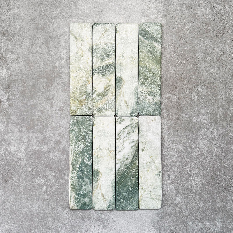 Product image of Amalfi Brick Salvia Vintage Marble wall and floor tiles in a 5.4cm x 22cm format, showcasing green and white marble effect detailing with natural veining and tonal variation.