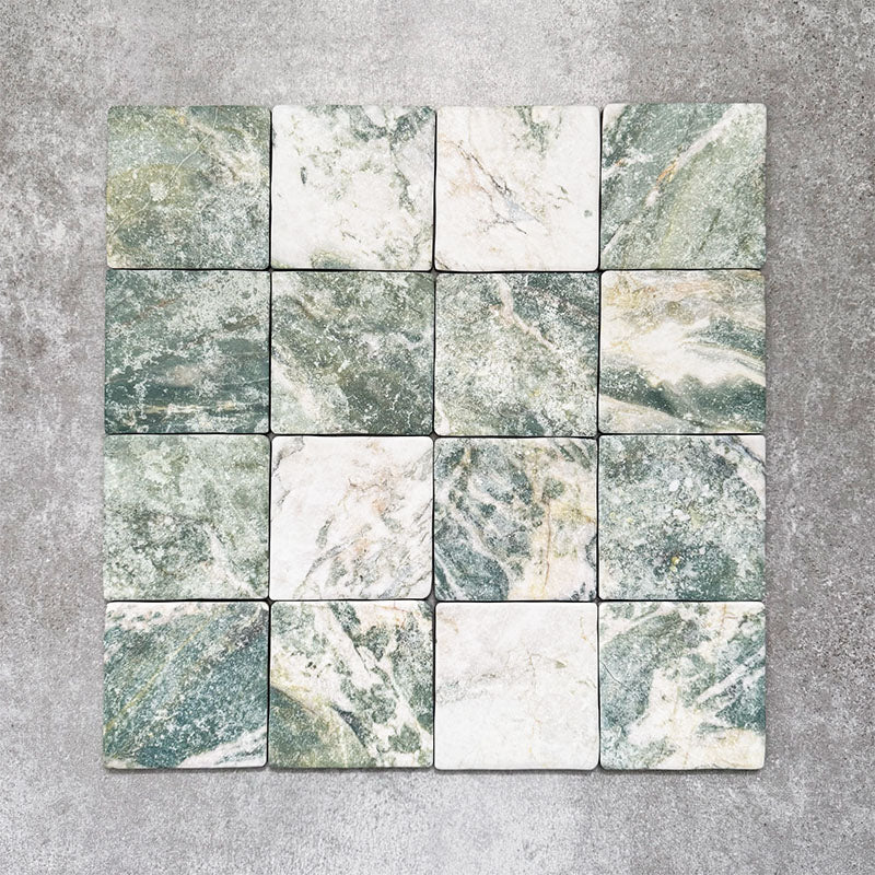 Product image of Amalfi Square Salvia Vintage Marble wall and floor tiles in an 11cm x 11cm format, featuring green and white marble effect detailing, natural veining and softly rounded vintage-inspired edges.