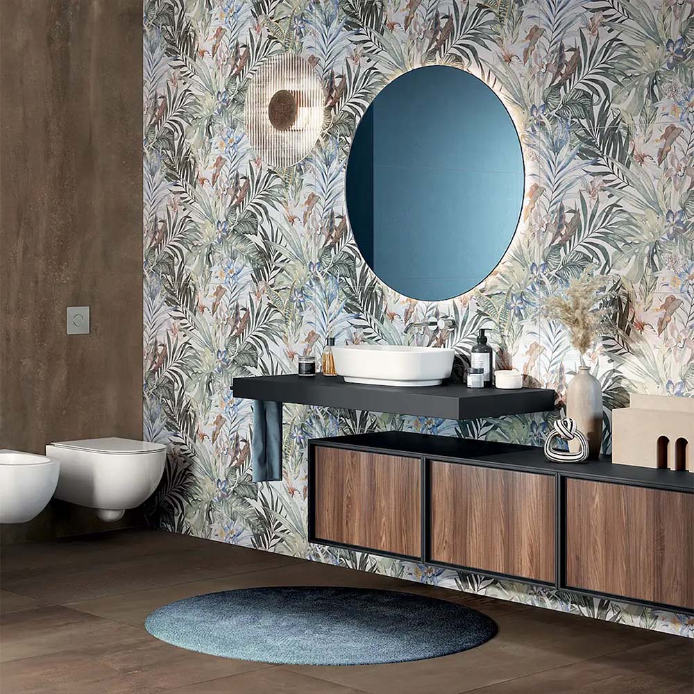 Bathroom featuring Bahamas 60 × 120cm wall and floor tiles, showcasing a detailed tropical leaf design with soft greens and warm tones. Paired with wood finishes and a floating vanity for a calm, nature-inspired space.