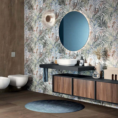 Bathroom featuring Bahamas 60 × 120cm wall and floor tiles, showcasing a detailed tropical leaf design with soft greens and warm tones. Paired with wood finishes and a floating vanity for a calm, nature-inspired space.