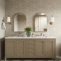 Bathroom setting featuring Benomar Canvas Moroccan style mini brick tiles in a 5x15cm format, finished in a soft matt surface. Laid in a horizontal brick pattern, the subtle tonal variation and handcrafted look create a gentle sense of texture across the wall.