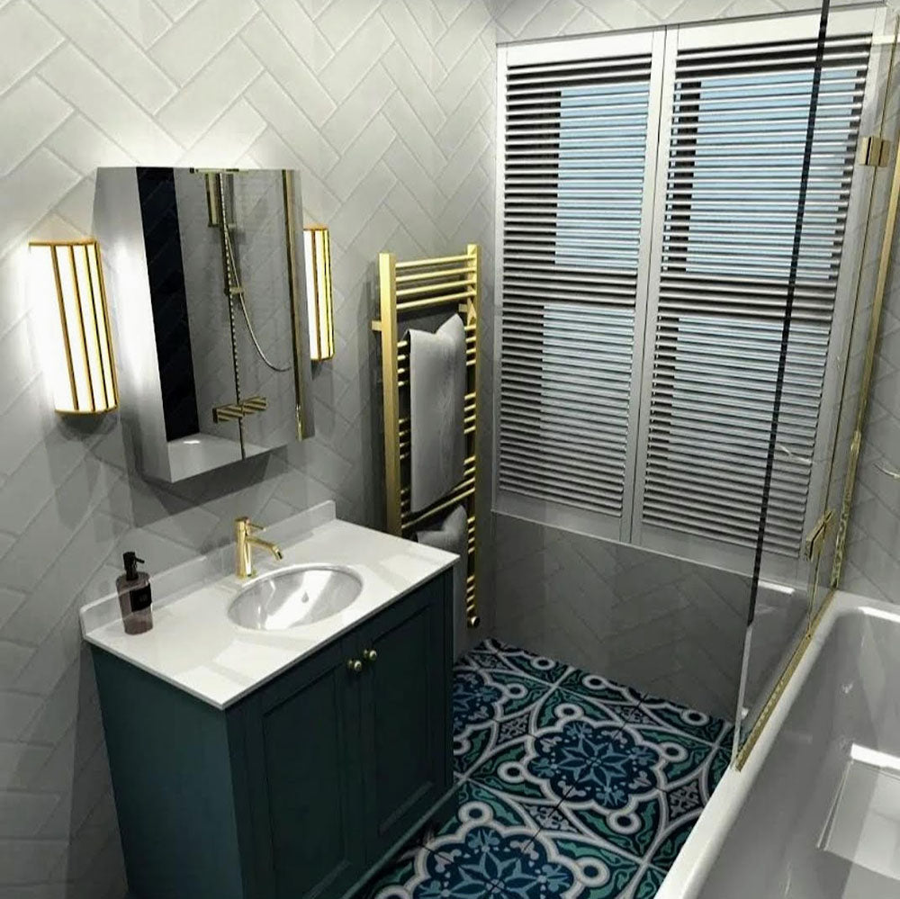 Bathroom interior featuring London Streets Baker Street 20x20cm Victorian Moroccan style floor tiles, styled with white herringbone wall tiles, brass fittings, green vanity unit and glass shower screen for a bold patterned bathroom floor.