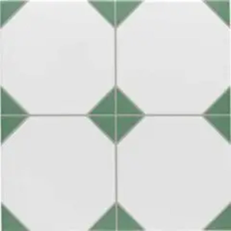Close-up of Belvoir Green 33 × 33cm Victorian style porcelain floor tiles, showcasing a classic white base with soft green geometric detailing. Ideal for creating timeless patterned floors in hallways, kitchens, or bathrooms.