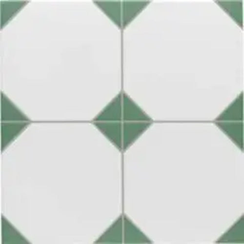Close-up of Belvoir Green 33 × 33cm Victorian style porcelain floor tiles, showcasing a classic white base with soft green geometric detailing. Ideal for creating timeless patterned floors in hallways, kitchens, or bathrooms.