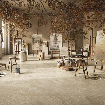 Studio space featuring Comet Earth Stone 2cm 60 × 90cm porcelain tiles, showcasing warm beige and taupe stone effect tones with subtle variation. Creates a soft, natural backdrop suited to calm, contemporary interiors and outdoor spaces.