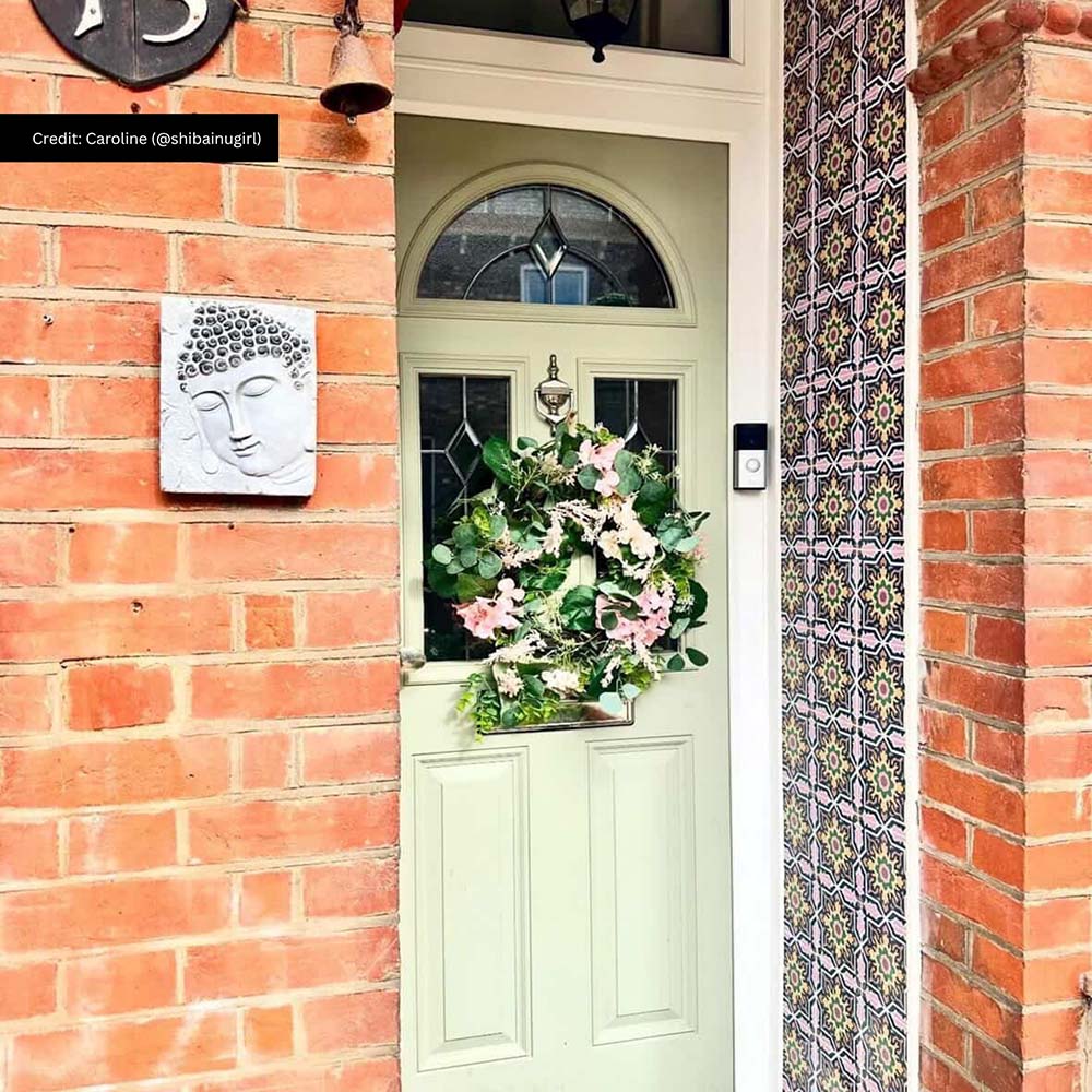 Entrance featuring Cuba Havana Mini 15x15cm Moroccan-style patterned wall tiles, styled alongside exposed brickwork and a sage green front door for a colourful, characterful exterior entrance design.