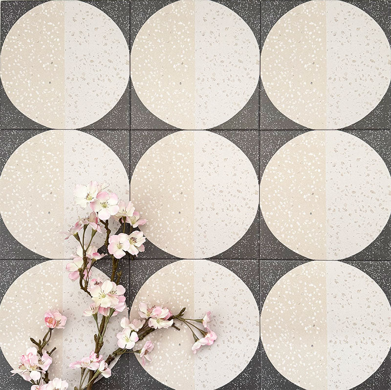 Eclipse Lunar 20x20cm terrazzo-style patterned tiles featuring circular geometric detailing with speckled stone-inspired texture, designed to create bold statement walls and contemporary patterned floor interiors.