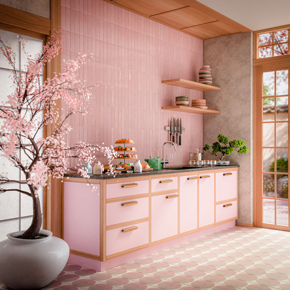 Interior featuring Eclipse Rosa terrazzo effect patterned tiles, combining soft blush pink and warm neutral tones in a striking circular geometric design. Paired with pink cabinetry, natural wood accents and delicate Japanese-inspired styling, this space creates a playful yet sophisticated look that feels bright, contemporary and full of personality. The repeating pattern adds movement and visual interest while maintaining a soft, elegant colour palette.
