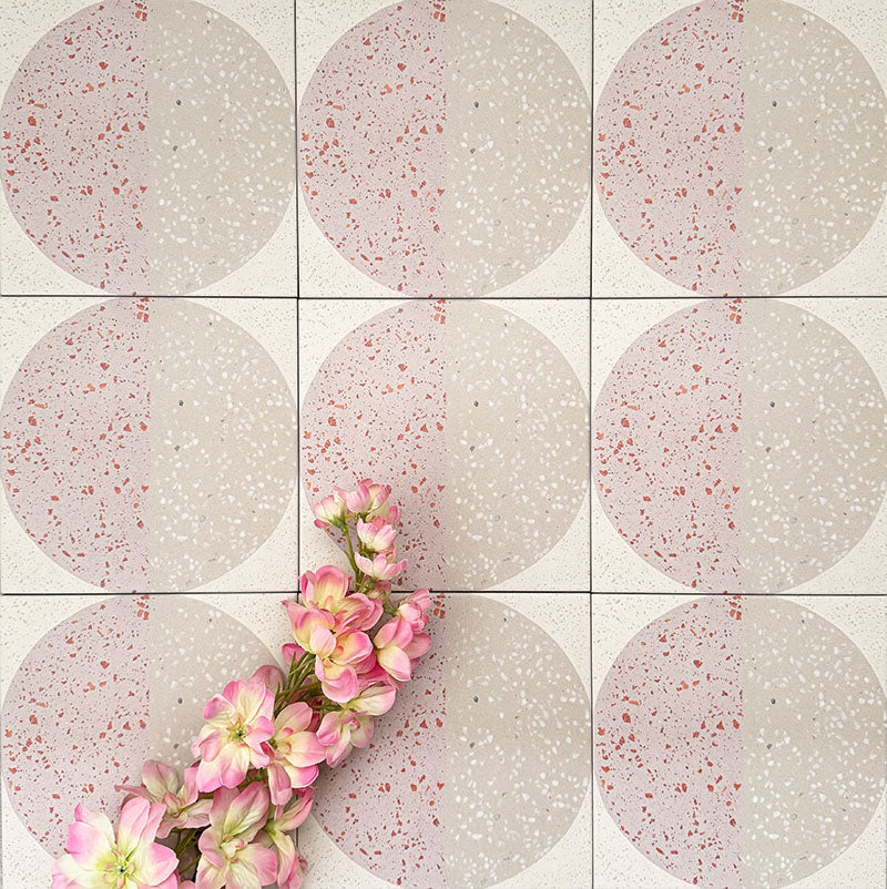 Eclipse Rosa 20x20cm terrazzo-style decor tiles featuring a soft geometric circle design in blush pink and warm neutral tones, creating a playful yet contemporary patterned floor or wall finish.