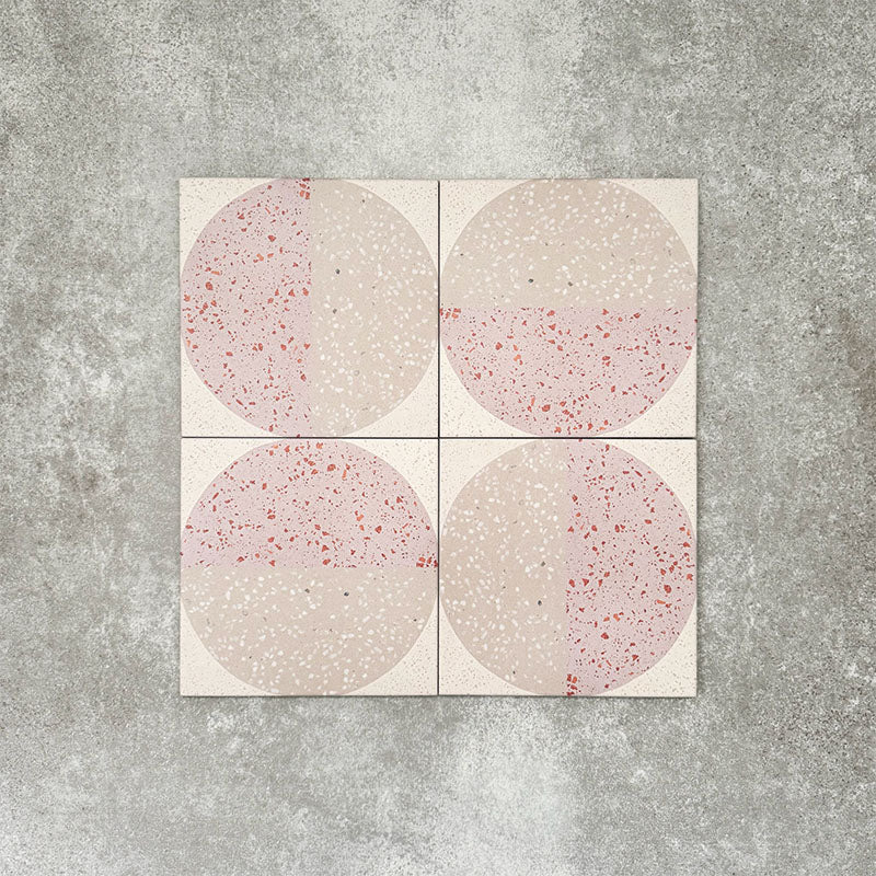 Eclipse Rosa 20x20cm terrazzo-style decor tiles featuring a soft geometric circle design in blush pink and warm neutral tones, creating a playful yet contemporary patterned floor or wall finish.