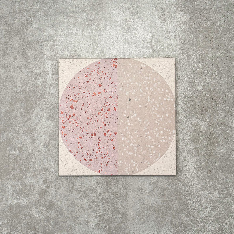 Eclipse Rosa 20x20cm terrazzo-style decor tiles featuring a soft geometric circle design in blush pink and warm neutral tones, creating a playful yet contemporary patterned floor or wall finish.