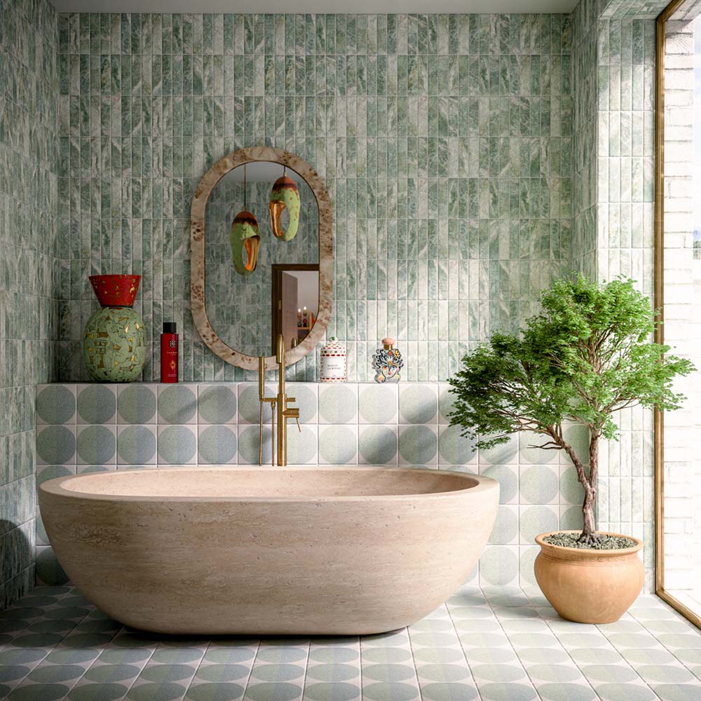 Bathroom featuring Eclipse Salvia 20x20cm terrazzo-effect patterned wall and floor tiles, styled with a freestanding stone bath, green marble-effect brick tiles, brushed brass fixtures and botanical-inspired contemporary décor