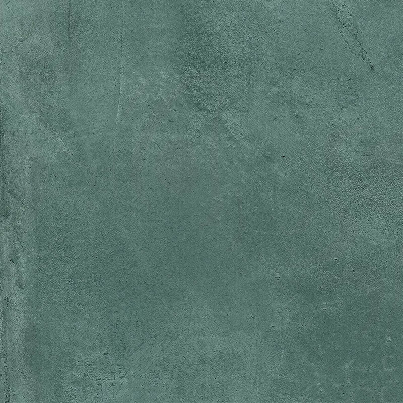 Close-up of Iron Emerald Green Oxide Metallic 60 × 60cm porcelain tile, highlighting rich green tones with subtle tonal variation, a softly textured surface, and a refined metallic effect that adds depth and character to contemporary interiors.