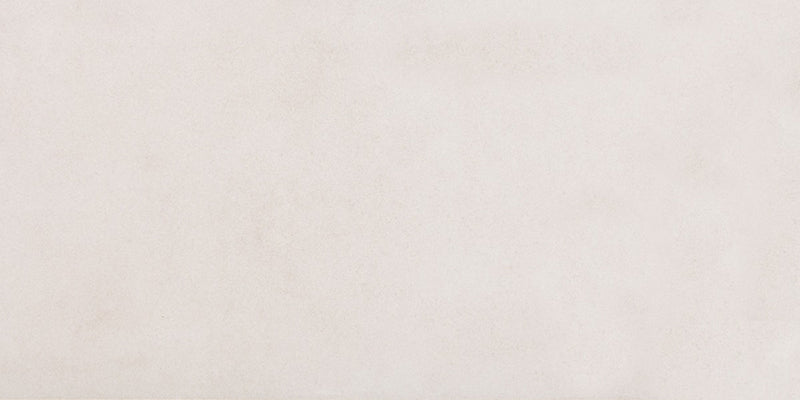 Close-up of Etna Marfil Matt 30 × 60cm porcelain tile, showcasing a soft beige tone with subtle surface variation and a smooth matt finish for a clean, contemporary look.