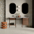 Bathroom vanity area featuring Etna Pearl Matt 30 × 60cm porcelain wall and floor tiles, styled with a double basin unit, black mirrors, warm wood cabinetry, and soft lighting for a refined, contemporary space.