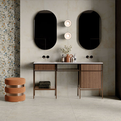 Bathroom vanity area featuring Etna Pearl Matt 30 × 60cm porcelain wall and floor tiles, styled with a double basin unit, black mirrors, warm wood cabinetry, and soft lighting for a refined, contemporary space.