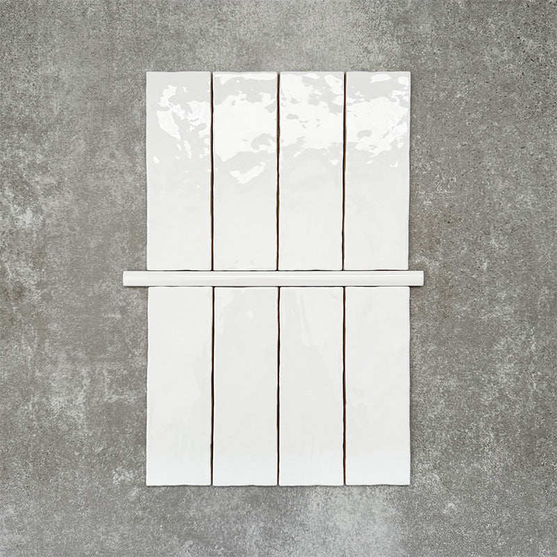 Foundry Arctic White 1.5x30cm gloss pencil bullnose border tile featuring a handcrafted-style finish with soft tonal variation, designed to complement contemporary wall tile layouts and decorative edging details.