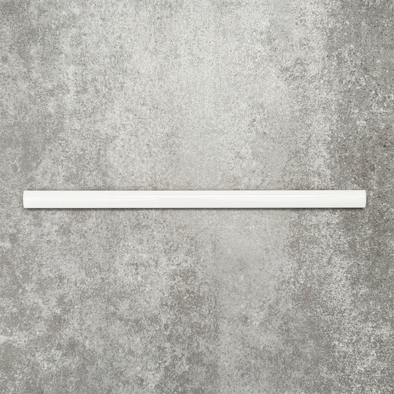 Foundry Arctic White 1.5x30cm gloss pencil bullnose border tile with a handcrafted-style finish and soft white glaze, designed for decorative edging, borders, and finishing details in contemporary wall tile installations.