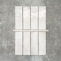 Foundry Chalk White 1.5x30cm gloss pencil bullnose border tile featuring a handcrafted-style finish with soft tonal variation, designed for decorative edging and refined finishing details in contemporary wall tile installations.