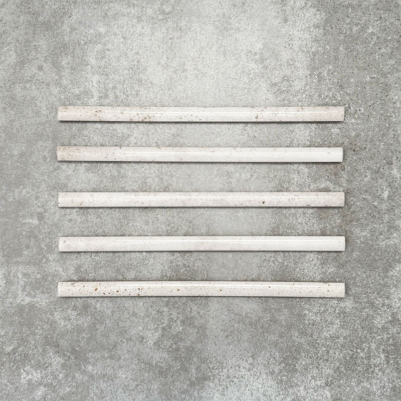 Foundry Chalk White 1.5x30cm gloss pencil bullnose border tile featuring a handcrafted-style finish with soft tonal variation, designed for decorative edging and refined finishing details in contemporary wall tile installations.
