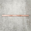 Foundry Coral Pink 1.5x30cm gloss pencil bullnose border tile featuring a handcrafted-style finish with warm blush and terracotta tones, designed for decorative edging and refined finishing details in wall tile installations.