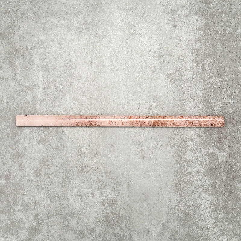 Foundry Coral Pink 1.5x30cm gloss pencil bullnose border tile featuring a handcrafted-style finish with warm blush and terracotta tones, designed for decorative edging and refined finishing details in wall tile installations.