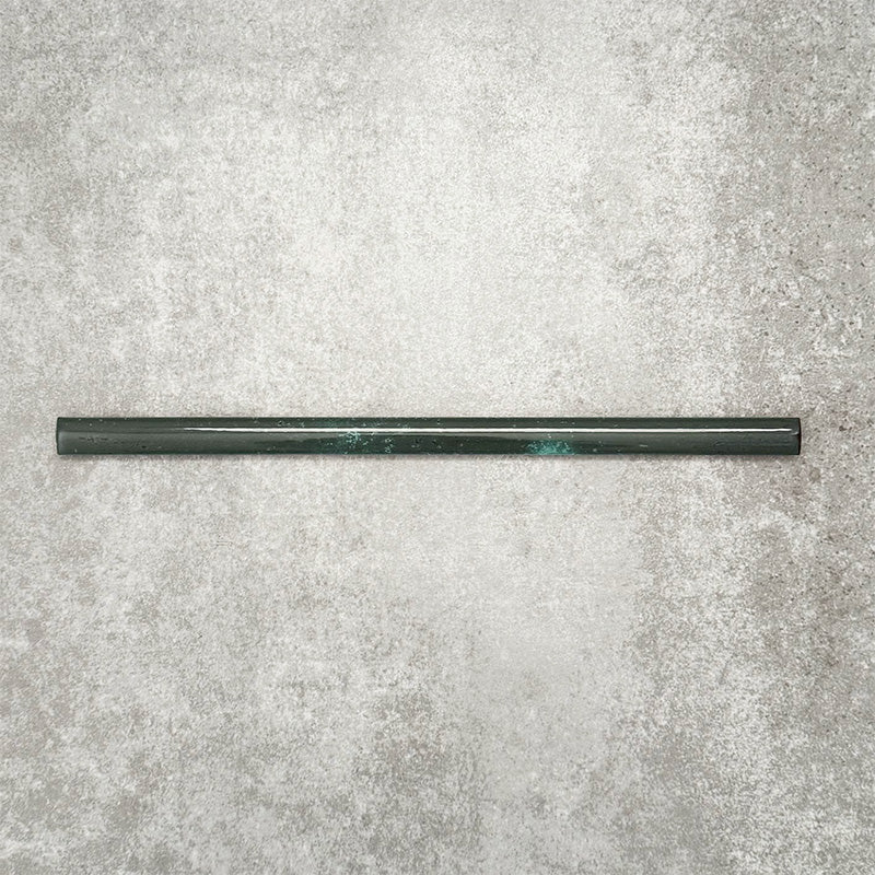 Foundry Marine Blue 1.5x30cm pencil bullnose border tile featuring a handcrafted-style finish with deep blue and teal tonal variation, designed for decorative edging and finishing details in contemporary wall tile installations.