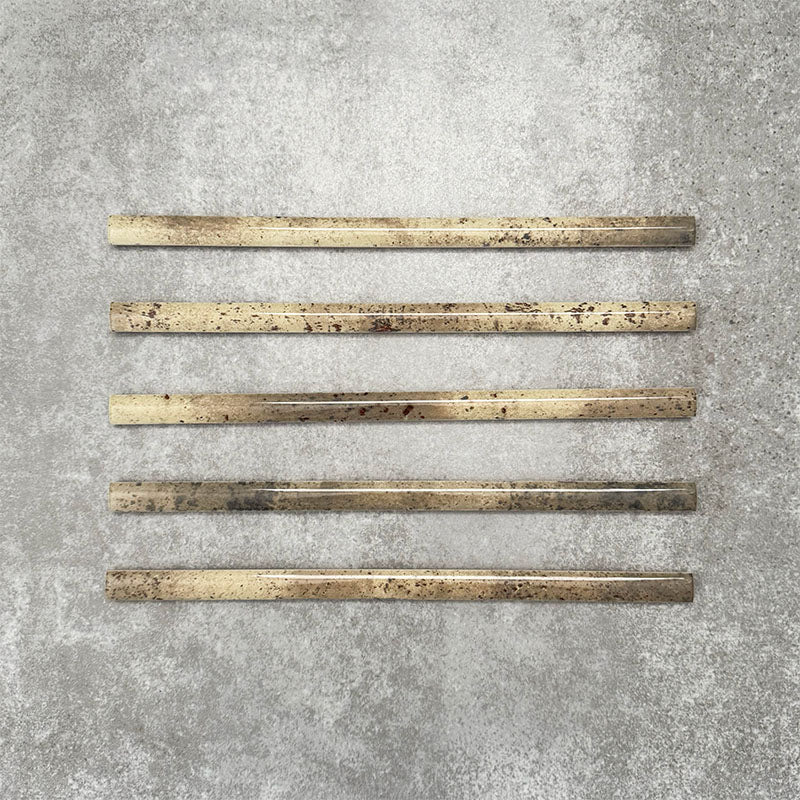 Foundry Moss Green 1.5x30cm gloss pencil bullnose border tile featuring a handcrafted-style finish with earthy olive and stone-toned variation, designed for decorative edging and refined finishing details in wall tile installations.