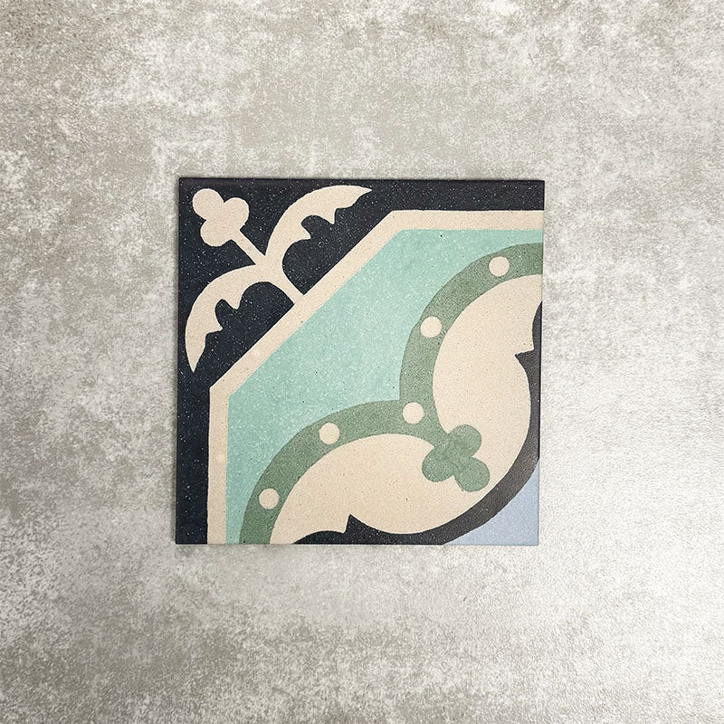 Single London Streets Goodwin Court 20x20cm Victorian Moroccan style porcelain tile displayed in a product setting, featuring an elegant geometric motif in soft blue, cream and charcoal tones inspired by traditional Victorian decorative floor tiles.
