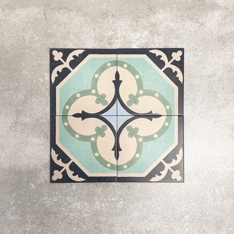Four London Streets Goodwin Court 20x20cm Victorian Moroccan style porcelain tiles arranged together to showcase the repeating soft blue, cream and charcoal geometric pattern inspired by traditional Victorian style decorative floor tiles.
