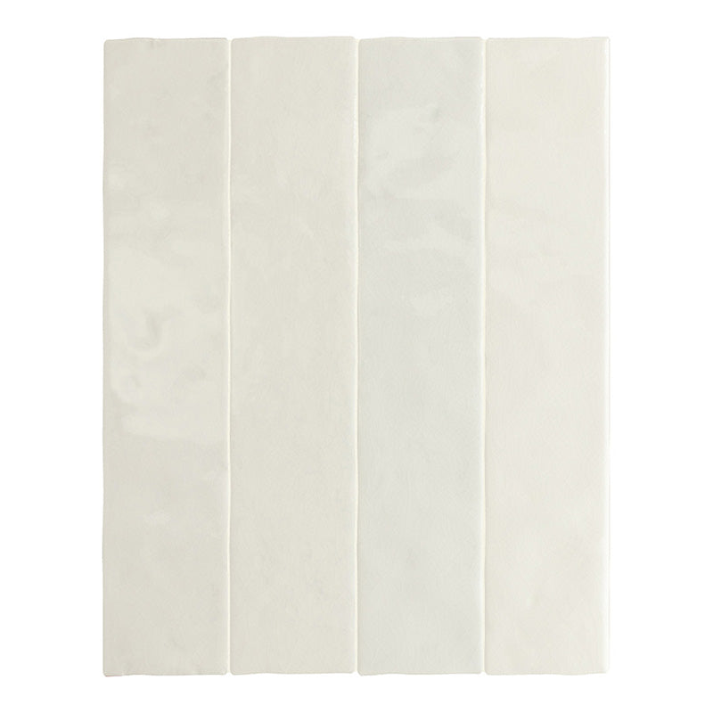 Bora Bora White Sand Brick ceramic wall tile in a 6.5 × 32.8cm slim brick format, featuring a soft white sand tone and a flux glaze finish with subtle surface variation, shown as a single tile on a white background.