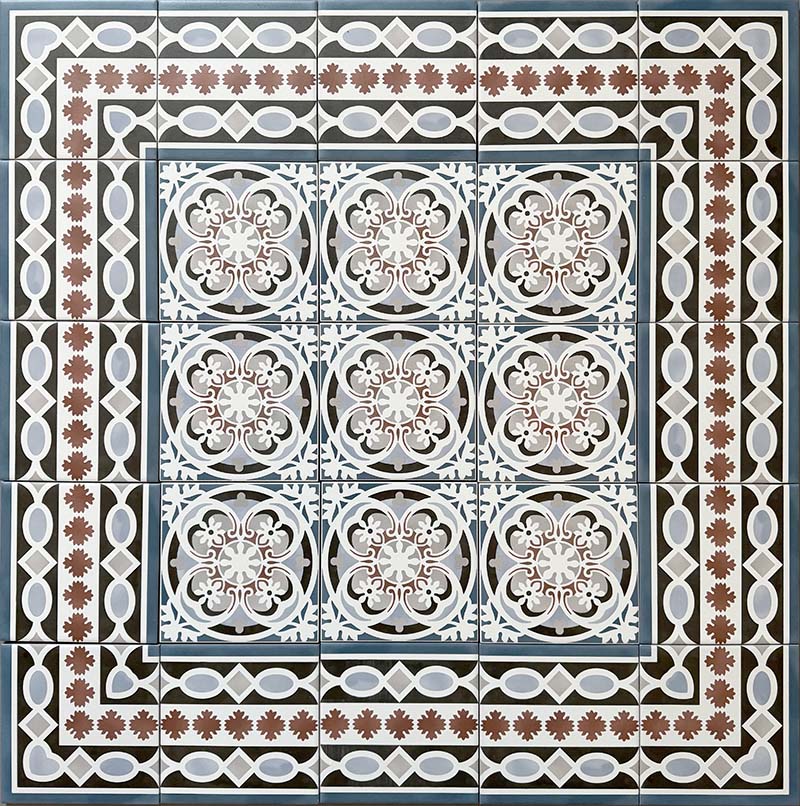 Decorative floor layout featuring Imperial Victorian Blue Mini Tiles, 15x15cm porcelain tiles with a classic Victorian-inspired pattern, arranged with coordinating border tiles to create a detailed period-style design.