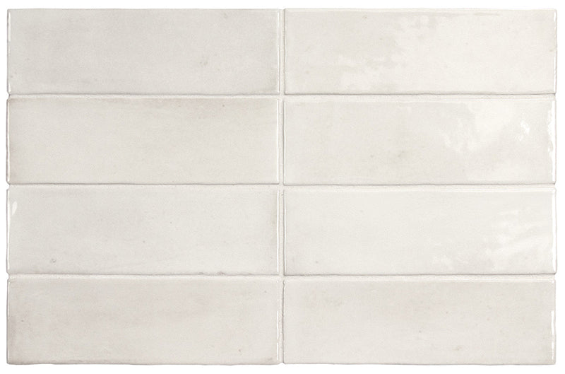 Benomar White Moroccan Mini Brick Gloss Tile 5x15cm shown in a classic brick layout, featuring soft white tones with subtle handcrafted effect variation and a high gloss finish, ideal for kitchen splashbacks and bathroom walls.