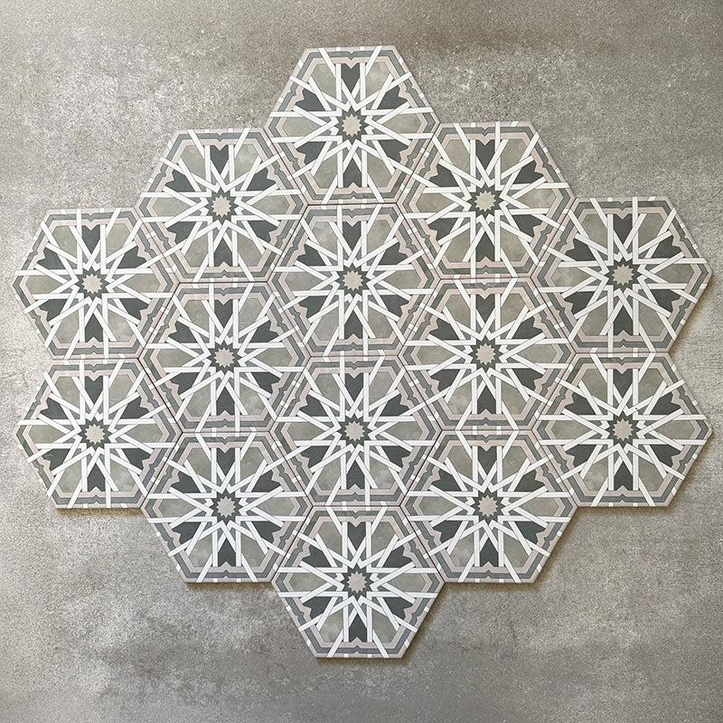 Grouped layout of Medina Hormuz Sage Green/Grey Moroccan-style hexagon porcelain tiles, 18.7 × 21.6 cm, showcasing the full repeating star-inspired geometric pattern in sage green, grey and white tones on a neutral background.
