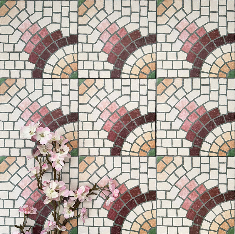 Cuba La Calle Moroccan-style porcelain tiles in a 20×20cm square format, shown in a repeating layout to highlight the circular mosaic-style pattern in soft white, terracotta, burgundy and green tones, with floral accents adding contrast to the tile’s vintage encaustic-style design.