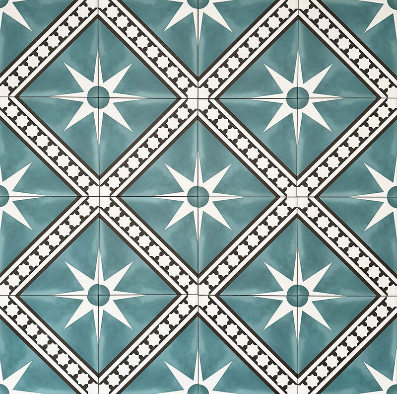 Gilgamesh Blue Moroccan style 20x20cm patterned tiles, shown as a flat lay to highlight the repeating blue, black and white geometric star pattern.