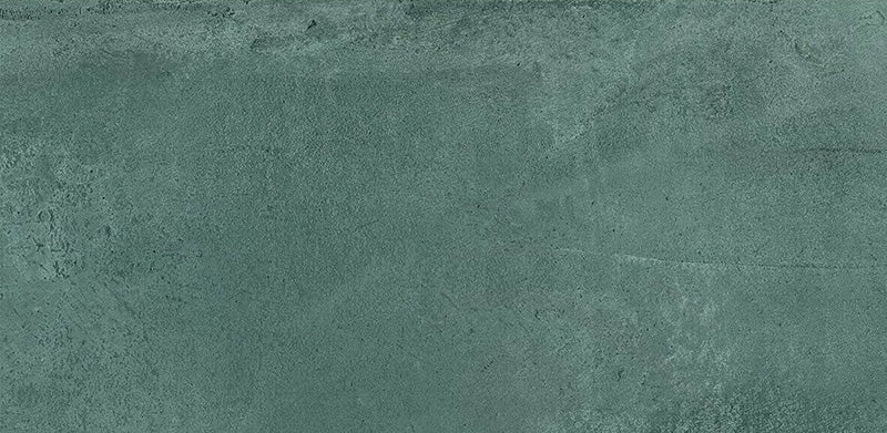 Close-up of Iron Emerald Green Oxide Metallic 30 × 60cm porcelain tile, highlighting rich green tones with subtle tonal variation, a softly textured surface, and a refined metallic effect that adds depth and character to contemporary interiors.