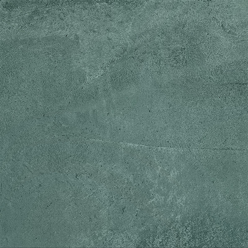 Close-up of Iron Emerald Green Oxide Metallic 80 × 80cm porcelain tile, showcasing deep green tones with soft tonal variation, a gently textured surface, and a subtle metallic effect that brings depth and a contemporary, industrial-inspired finish to interior spaces.
