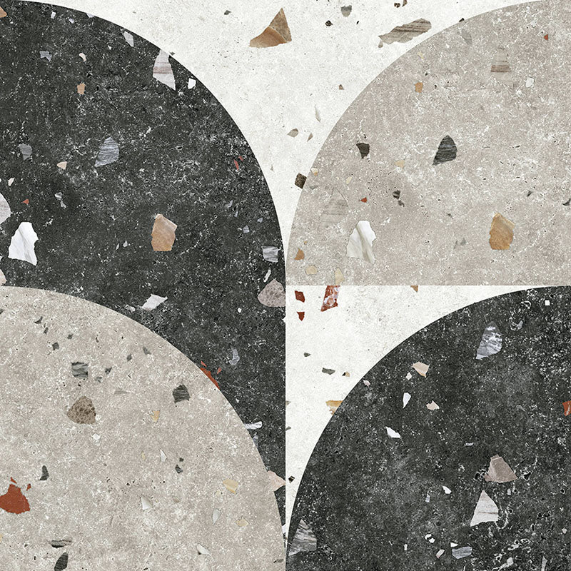 Flat lay of Jericho Decor Terrazzo 66 × 66cm porcelain wall and floor tile, featuring a terrazzo base with multicoloured aggregate chips combined with bold geometric quarter-circle patterning in contrasting light and dark tones, creating a striking, contemporary statement design.