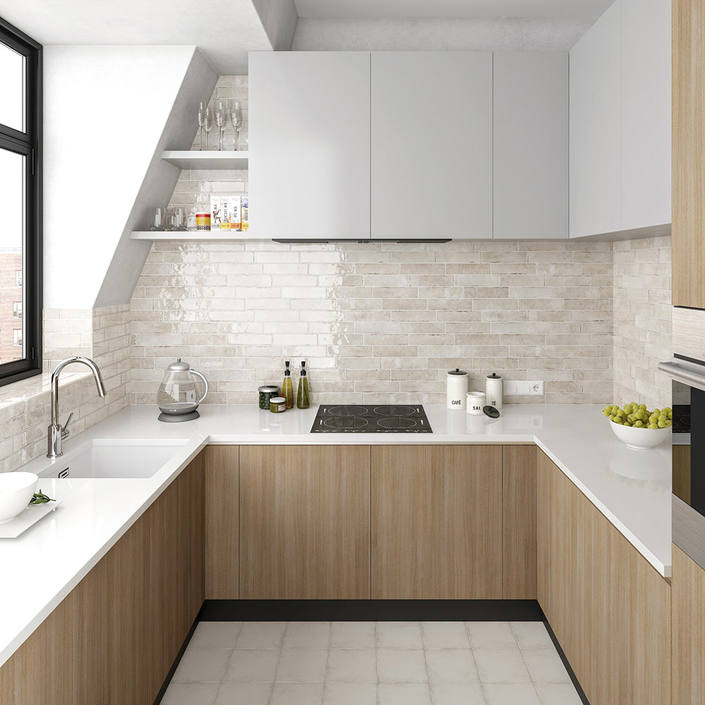 Kitchen featuring Nomad Oatmeal brick  wall tiles in a 6 × 24.6cm format, used as a splashback to add a warm, industrial-style finish.