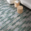 Living area featuring Lucca Abacus 3D Décor 60 × 120cm porcelain floor tiles, showcasing an elongated geometric pattern in soft green, grey, and marble-effect tones with contemporary wood furniture and neutral interiors.