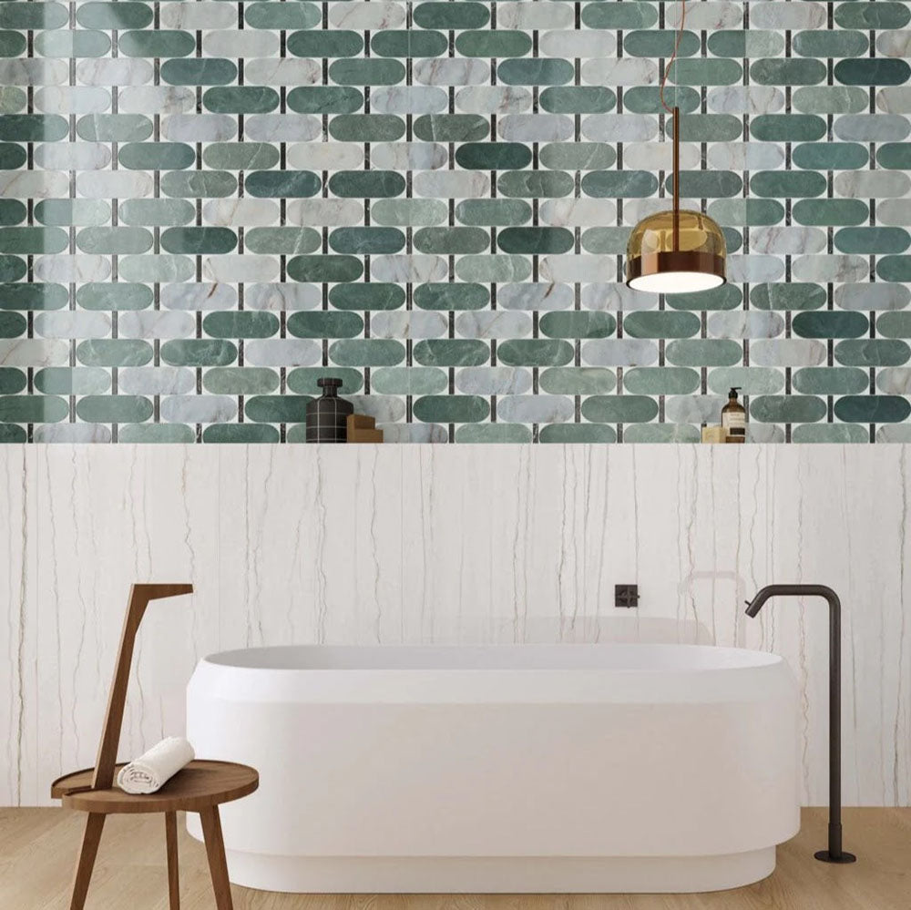 Contemporary bathroom featuring Lucca Abacus 3D Décor 60 × 120cm porcelain wall tiles, showcasing an elongated geometric pattern in soft green and marble-effect tones, paired with warm wood details and modern fittings.