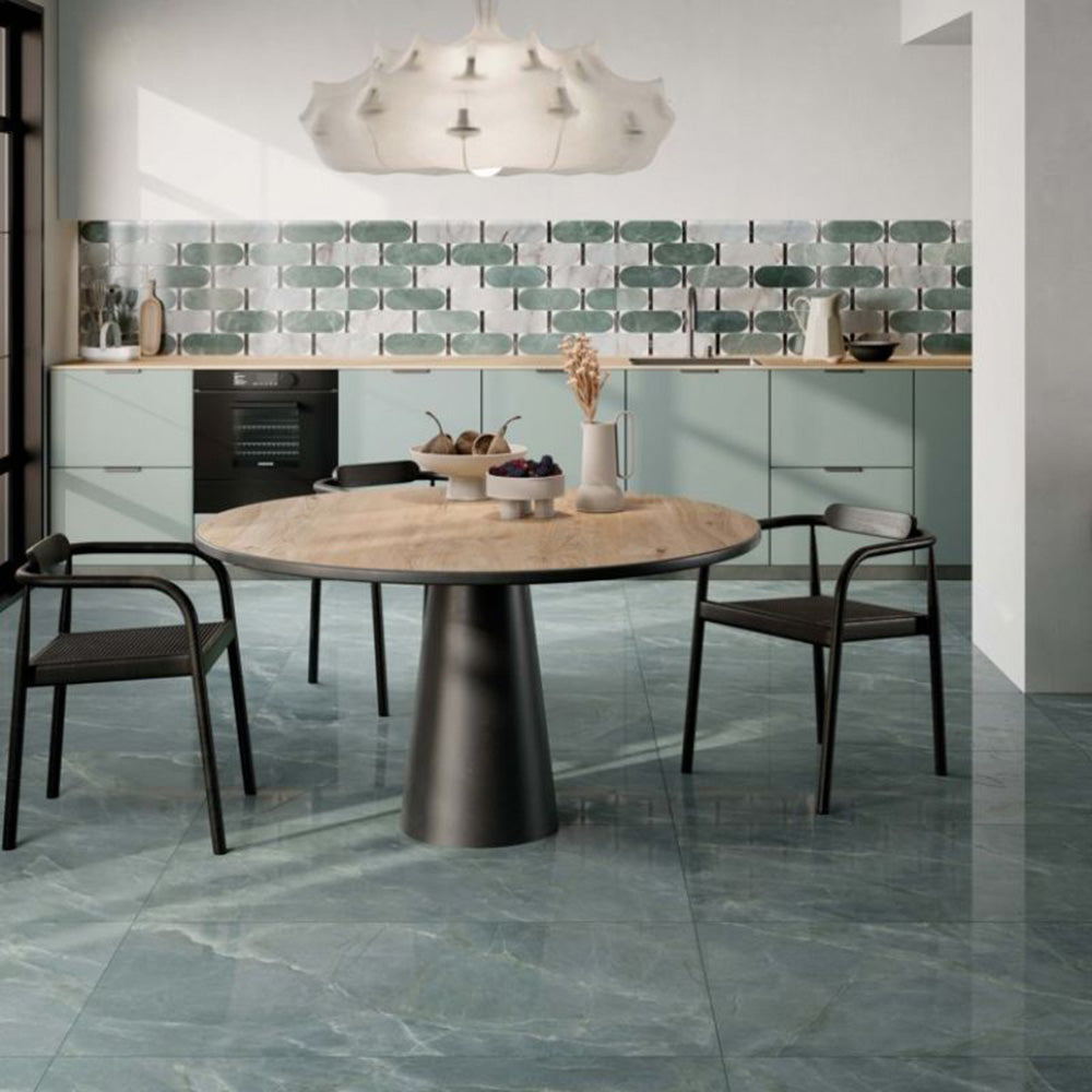 Contemporary kitchen featuring Lucca Abacus 3D Décor 60 × 120cm porcelain splashback tiles, showcasing an elongated geometric pattern in soft green and marble-effect tones, paired with sage cabinetry and modern interiors.